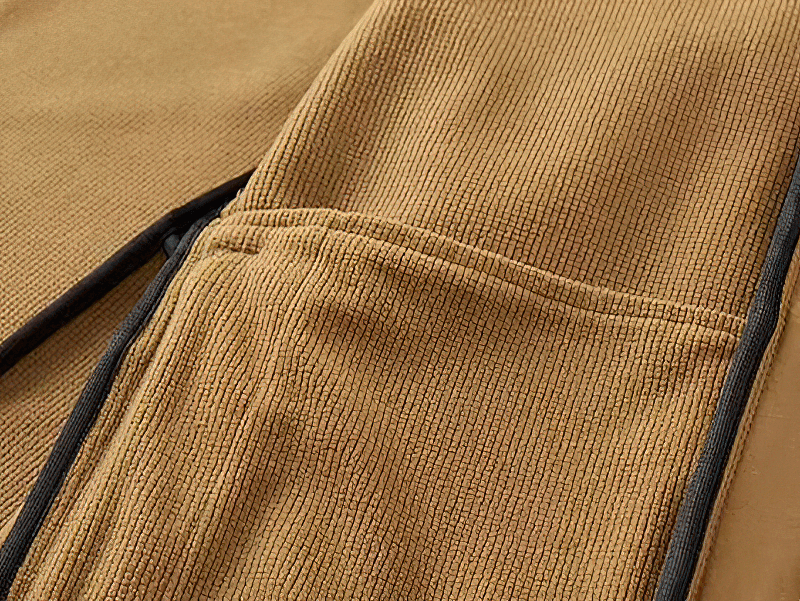 Zoomed view of the textured fabric and zipper detailing on the Casual Waterproof Men's Zipper Jacket with Hood - SF0689